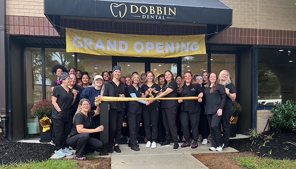 Grand opening! Staff outside of the new building